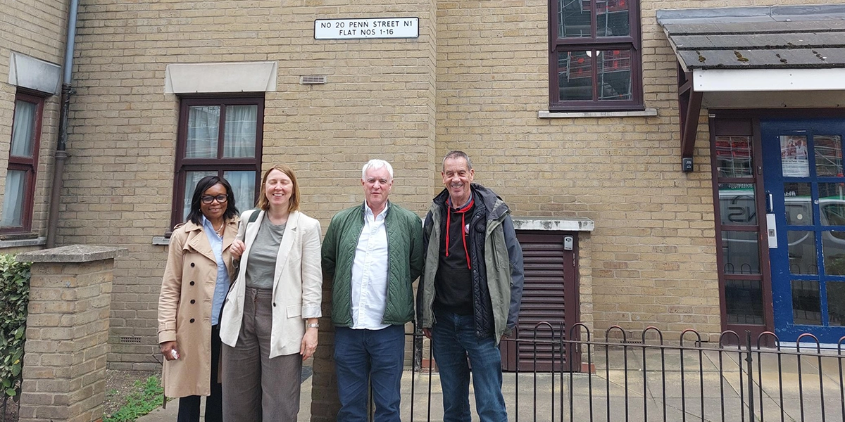 Deeion (Head of Housing Management), Pippa, Jerome and Mike outside Penn Street during a Leadership Team walkabout.