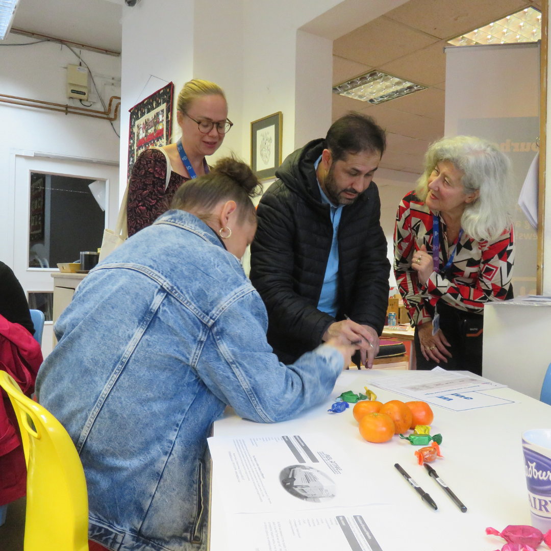 ISHA staff and ISHA residents at a Neighbourhood Nights event.