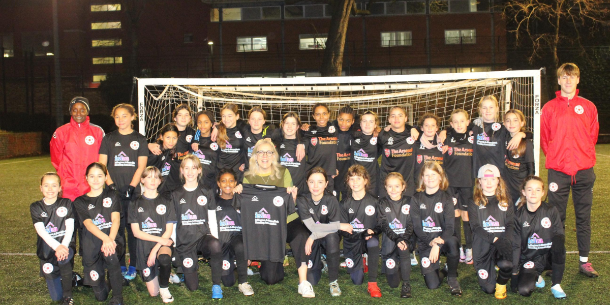 ISHA CEO Ruth Davison with Islington District Girls players and coaches.